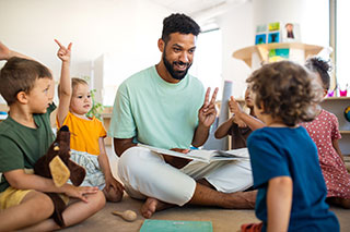 Teacher with children in daycare