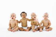 Four infants with dipers
